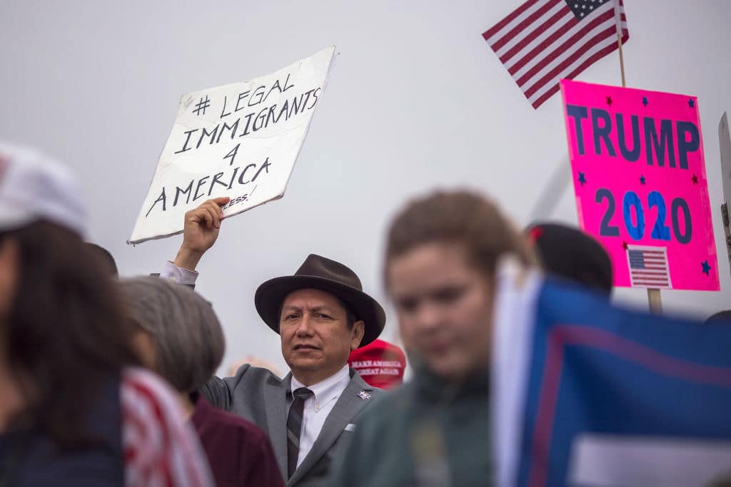 Supporters of U.S. President Donald Trump rally for the president during his visit to see the controversial border wall prototypes on March 13, 2018 in San Diego, California. (Getty Images)