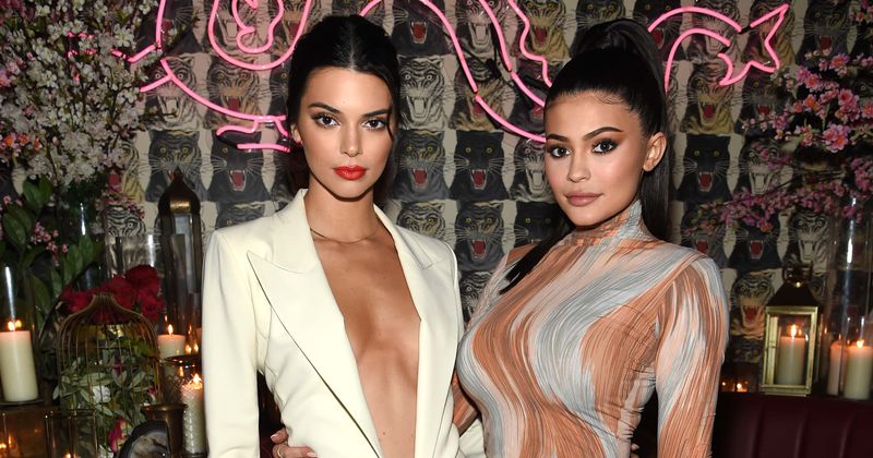 Kendall and Kylie Jenner attend Drake's New Year bash despite his feud with their brother-in-law Kanye West