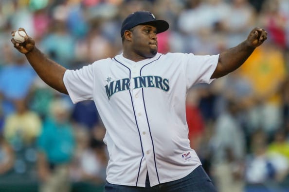 Brandon Mebane throws out the ceremonial first pitch prior to the game between the Seattle Mariners and the Oakland Athletics at Safeco Field on July 12, 2014, in Seattle, Washington (Getty Images)