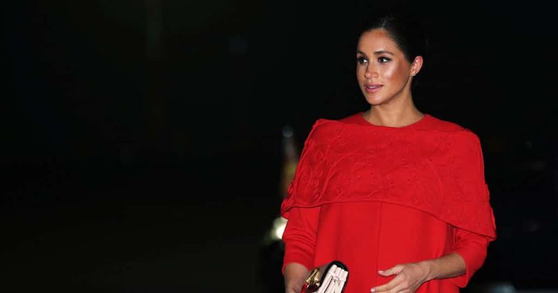Duchess in the city: Meghan Markle cradles her baby bump as she steps out in New York ahead of her baby shower