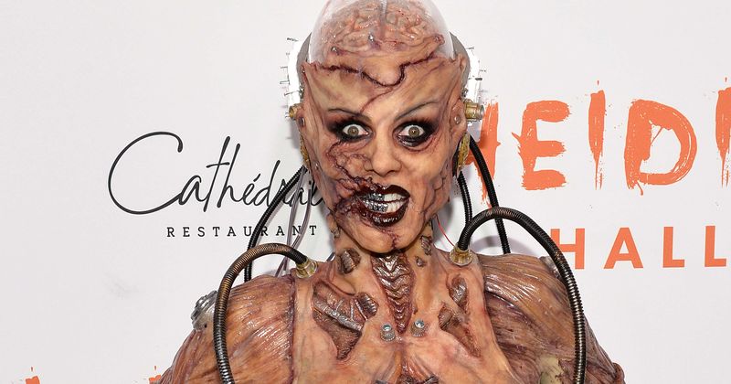 THE HORROR! Heidi Klum rocks 'alien experiment gone wrong' Halloween costume at her New York party