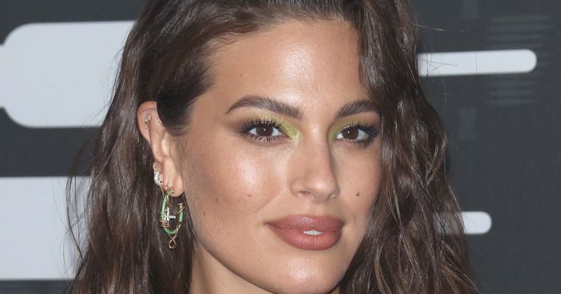 Model Ashley Graham reveals baby's gender, due date on Ellen DeGeneres show as she flaunts bump in low-cut gown