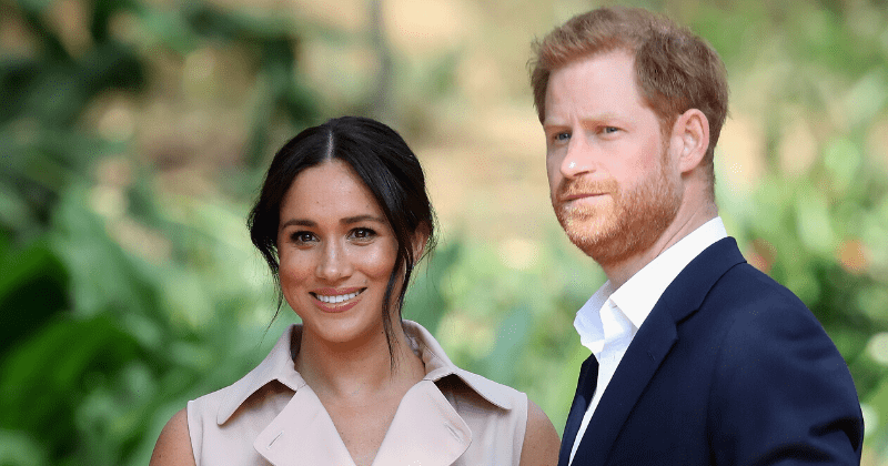 Royal fans believe Meghan Markle could be pregnant with second baby as she keeps 'hand on bump'