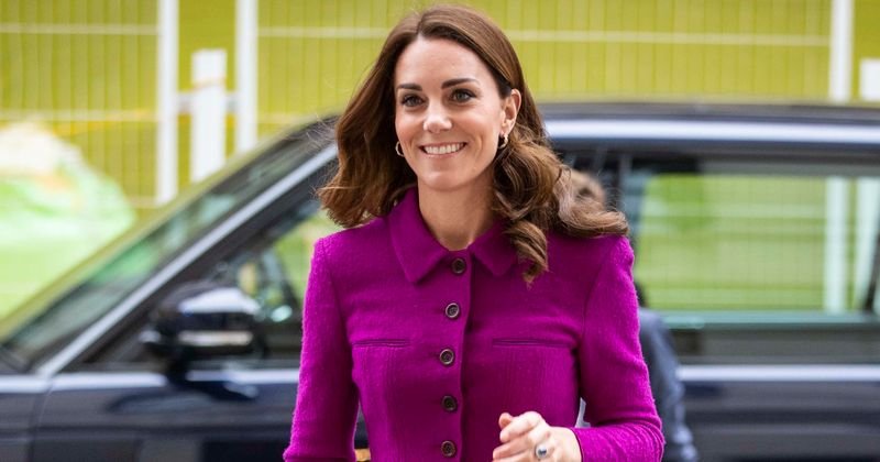 Kate Middleton stuns in purple peplum dress as she interacts with children at medical facility