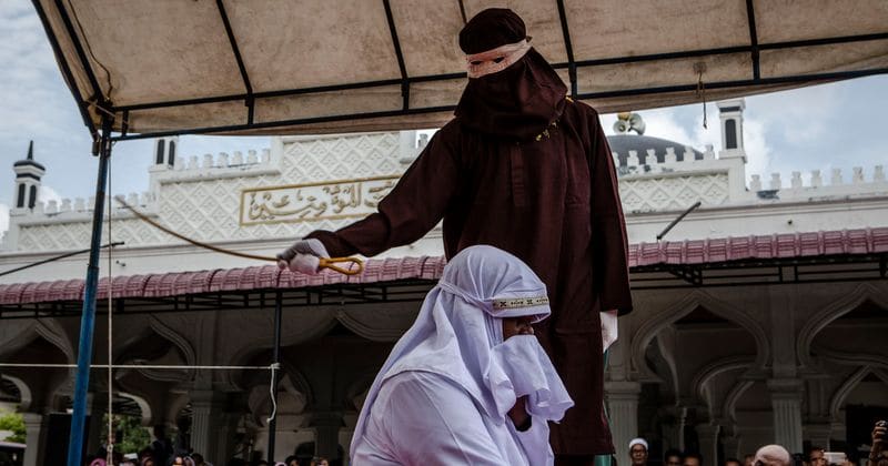 Two women in Indonesia flogged until they are unable to walk under Sharia law after being caught with men in hotel raid