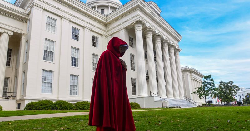Florida couple defends 'Handmaid's Tale'-inspired pregnancy photoshoot amid backlash of 'promoting rape': 'We don't give a f***'