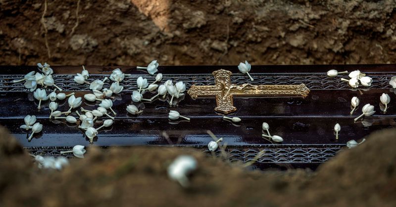 Michigan mom sues priest for condemning her son's suicide during funeral service and calling it a 'sin against god'