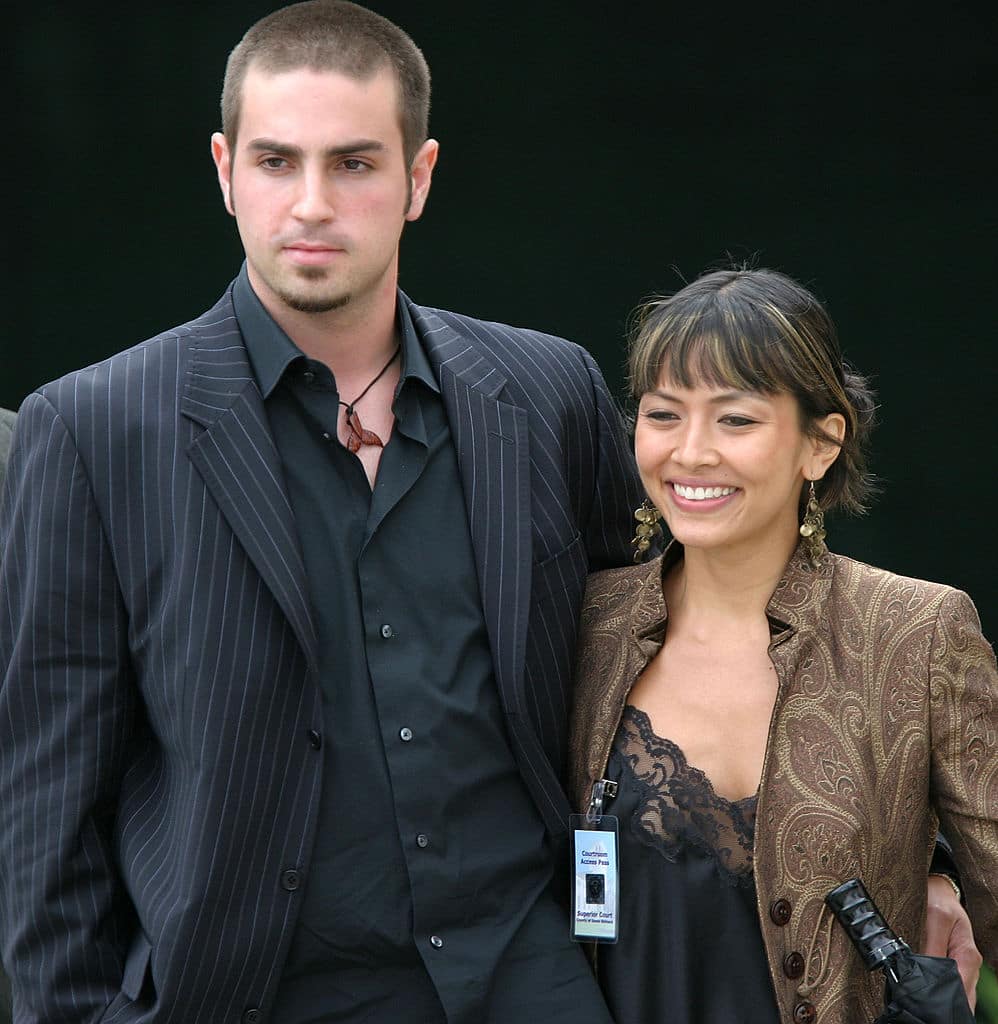 Defense witness Wade Robson (L) and unidentified woman and exit the Santa Barbara County Superior Court for Michael Jackson's child molestation trial May 5, 2005 in Santa Maria, California. Jackson is charged in a 10-count indictment with molesting a boy, plying him with liquor and conspiring to commit child abduction, false imprisonment and extortion. (Photo by Connie Aramaki/Getty Images)