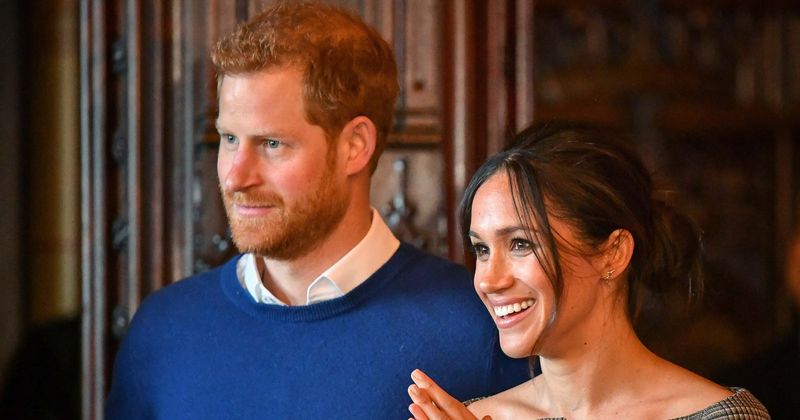 Prince Harry and Meghan Markle urge fans to 'reflect on the lonely, hungry, and homeless' during the festive holiday season