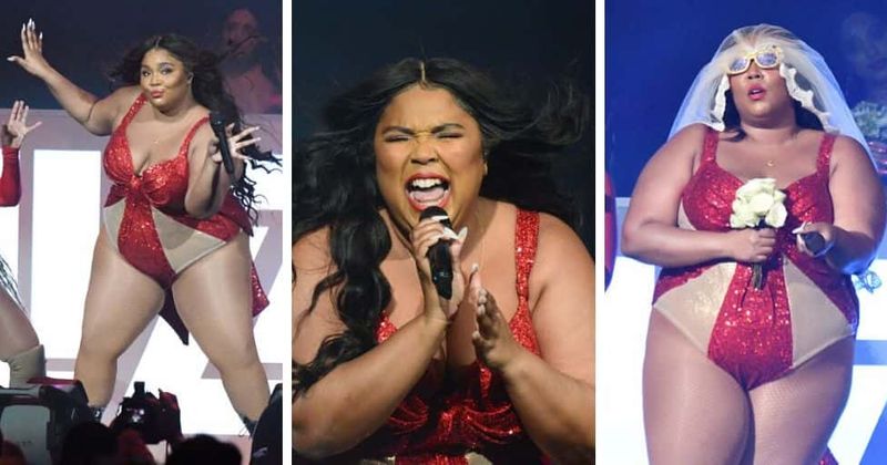 Lizzo dazzles in sparkling sexy leotard wrapped in festive red bow at iHeartRadio Jingle Ball concert