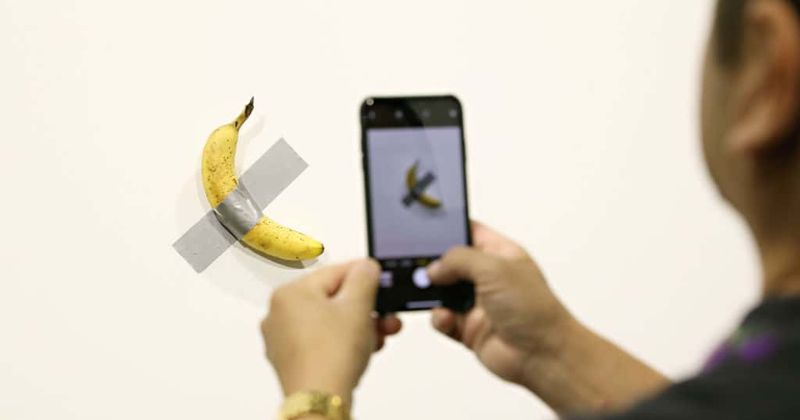 'Hungry artist' eats Comedian, a $120,000 artwork that featured a banana duct-taped to wall at Art Basel in Miami