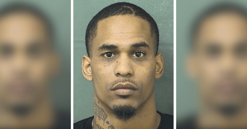 Florida father arrested for bringing loaded gun to school after son called him and cried that a teacher had 'slammed' him