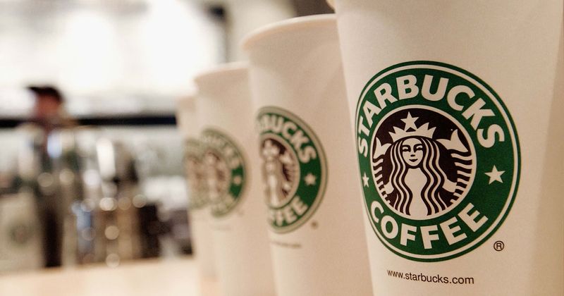 Starbucks apologizes after two uniformed officers in California say the outlet's employees refused to serve them