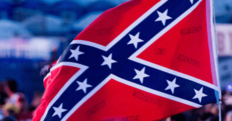 Iowa man displays Confederate flags and Swastika in front of his house, says they are not racist: 'People don't know their history'