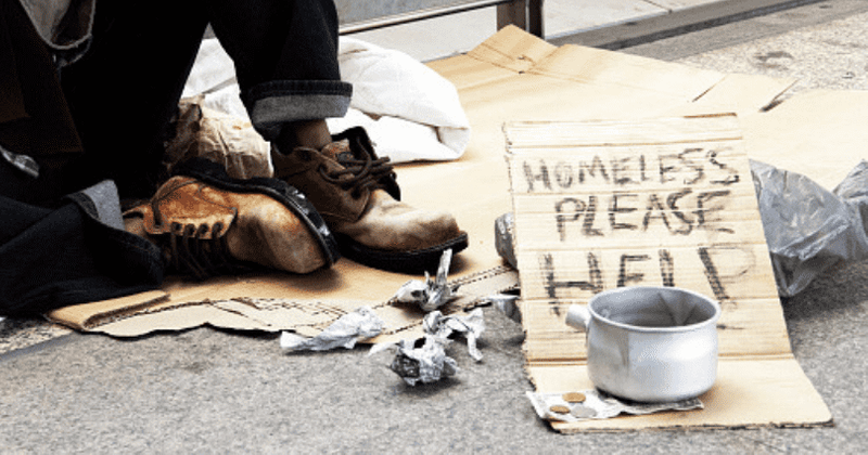 Alabama police apologize after cops pose with 'quilt' made of signs taken from homeless people before Christmas