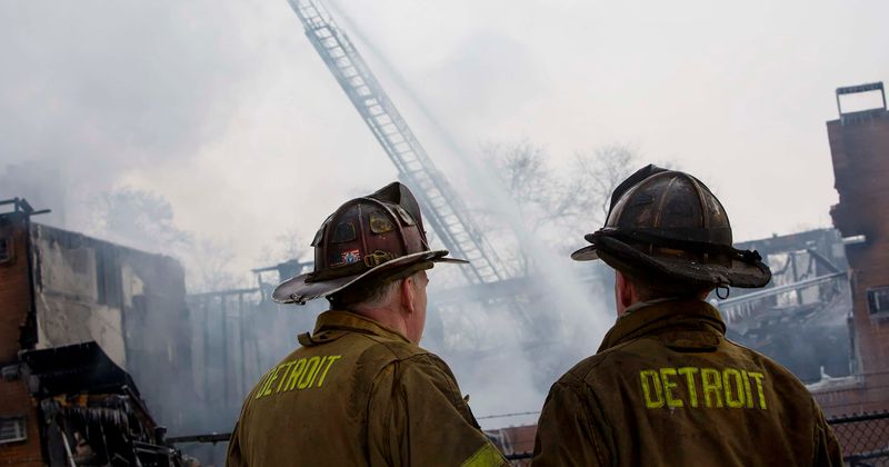 Detroit firemen pose for 'selfie on New Years' in front of burning home, slammed for being insensitive