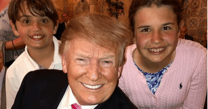 Trump plays the doting grandpa in sweet picture with his grandchildren shared by Trump Jr.