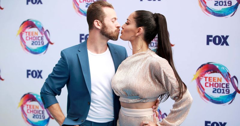 Nikki Bella gets engaged to Artem Chigvintsev after year of dating: 'I said yes in France in November'