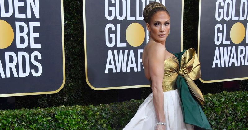 Golden Globes 2020: Fans are comparing Jennifer Lopez's giant bow gown to Ryan Reynold's Christmas sweater