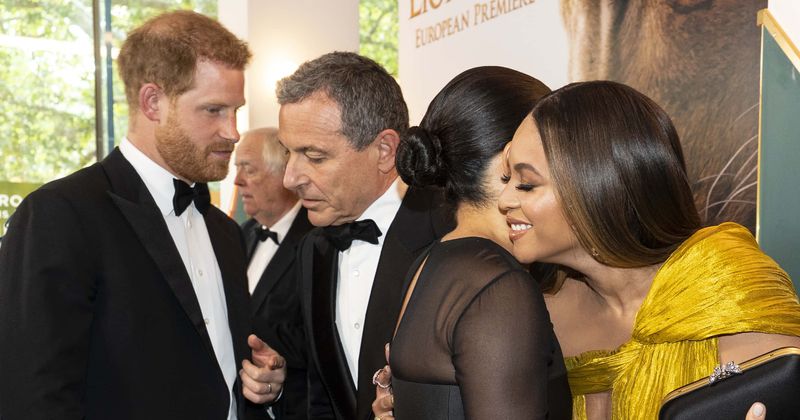 Prince Harry seen asking Disney boss to give Meghan Markle a voiceover job in video from 'Lion King' premiere