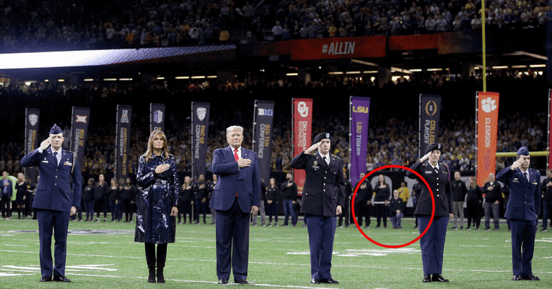 Minnesota 'Teacher Of The Year' snubs Trump by taking a knee during National Anthem right behind the President