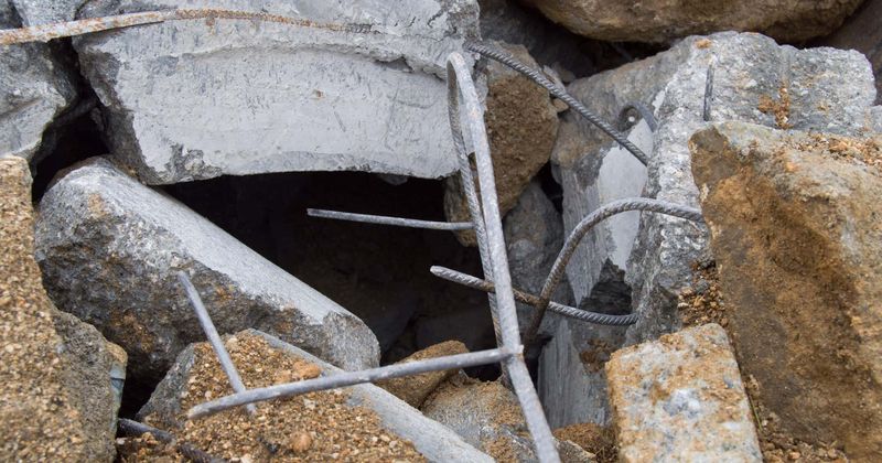 Teen crushed to death after scaffolding collapses at construction site trapping him under a pile of steel