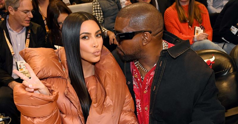 Kim Kardashian and Kanye West kiss courtside at NBA All-Star Game in Chicago which was shared on the Jumbotron
