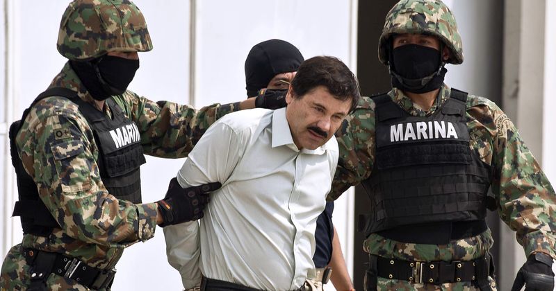 El Chapo has hair, mustache shaved off by guards in rare prison video, tells them he is a 'farmer'