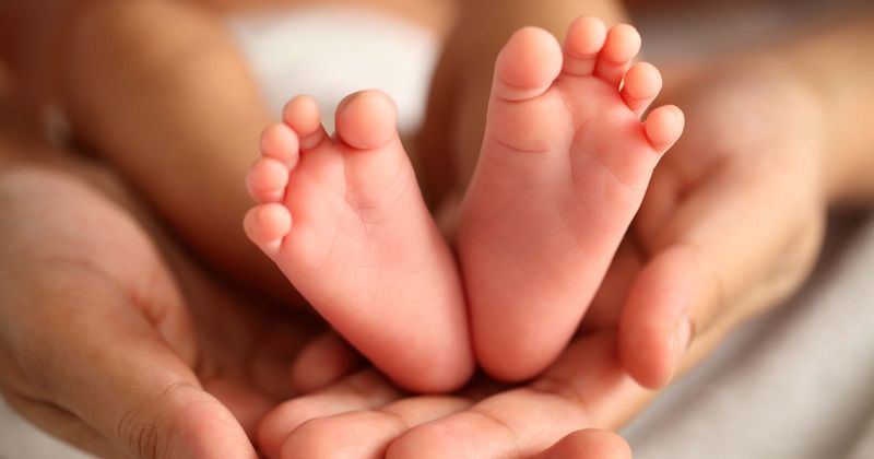 One-year-old suspected to be infected with coronavirus after family dismissed 'roaring temperature' for teething
