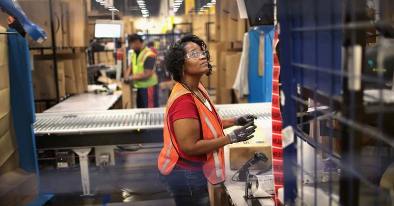 Many Amazon workers infected with coronavirus as expert warns cantagion can live on packages for up to 24 hours