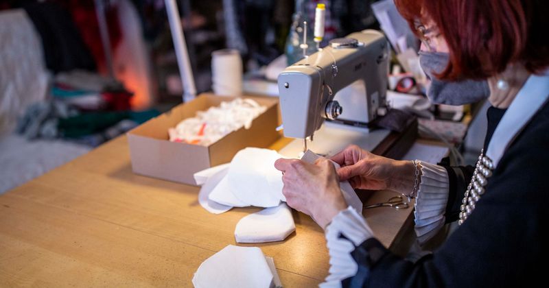 From making masks to donating wedding gowns, here's how the fashion industry is helping fight coronavirus