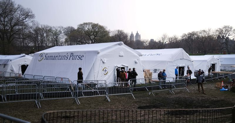 US forced to set up emergency hospitals to ease pressure on healthcare system buckling under coronavirus strain