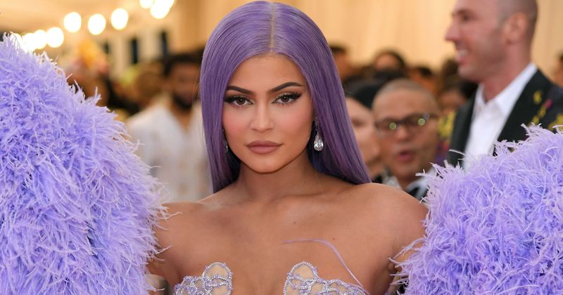 Kylie Jenner, worth $1B, spends $5.5k on matching crystal cheetah clutches for older sisters Kim and Khloe