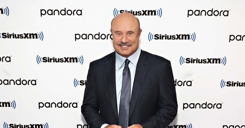 'Who Wants To Be A Millionaire': Dr Phil is so agonizing that fans want to 'throttle the idiot'