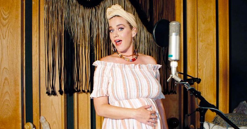 Katy Perry shows off massive baby bump in 'Daisies' music video, leaves fans 'crying with happiness'
