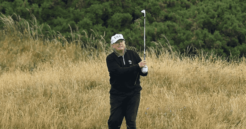 Trump shakes hands with golf buddies as he ditches mask while putting, Twitter blasts him: 'Such a Covidiot'