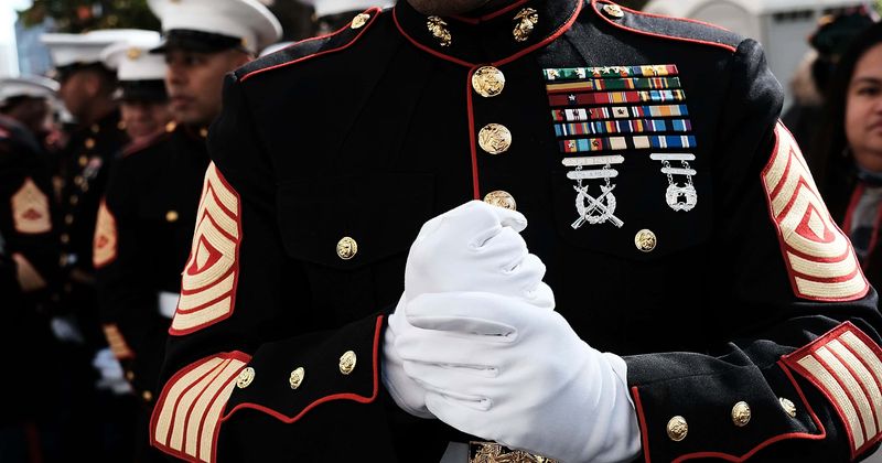 Marine veteran kneels at Utah capitol with 'I can't breathe' taped over mouth till his shoes start melting