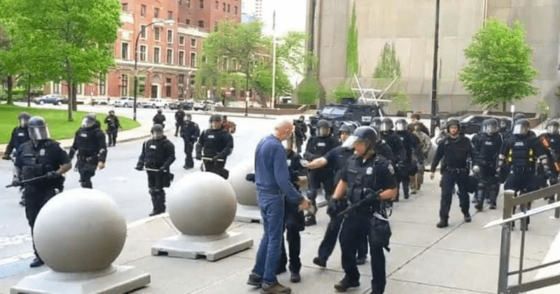 Elderly protester who was pushed to the ground by Buffalo police officers has suffered brain injury, says lawyer