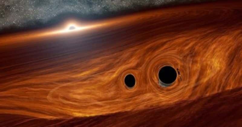 Scientists may have detected light from a violent merger of two black holes for the first time