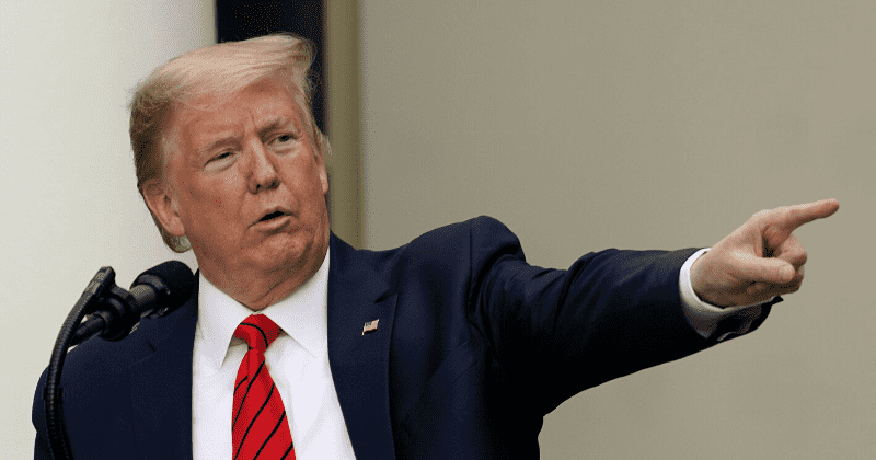 Trump applauds elderly supporter yelling 'white power' at hecklers during parade in Florida retirement village