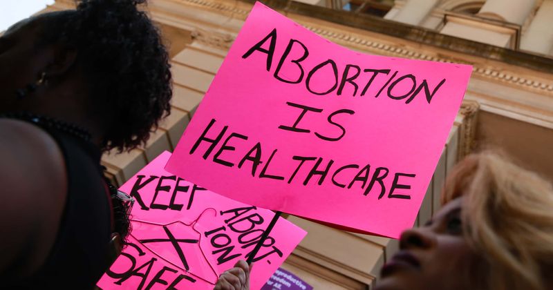 Supreme Court strikes down Louisiana law on abortion clinic restrictions in major win for pro-choice activists