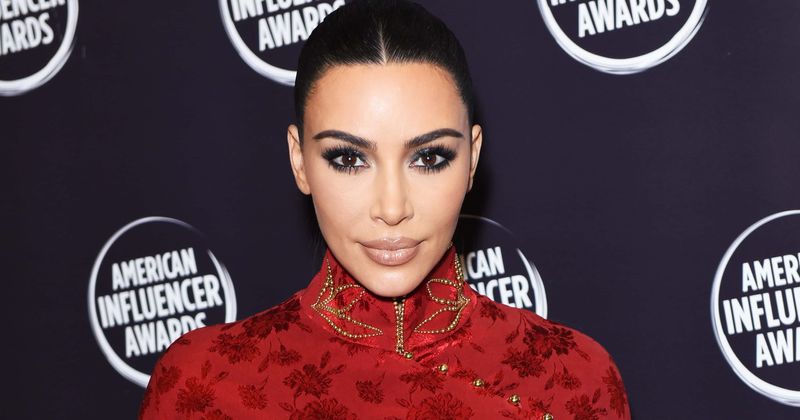 Kim Kardashian shows off her new fiery red hair in video, gets accused of copying Dua Lipa's style