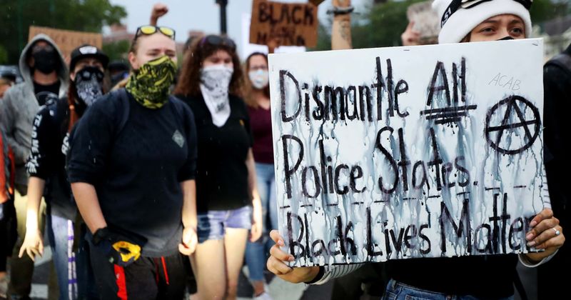 Massachusetts officer fired over posting pic of niece at BLM protest holding sign calling for shooting of cops