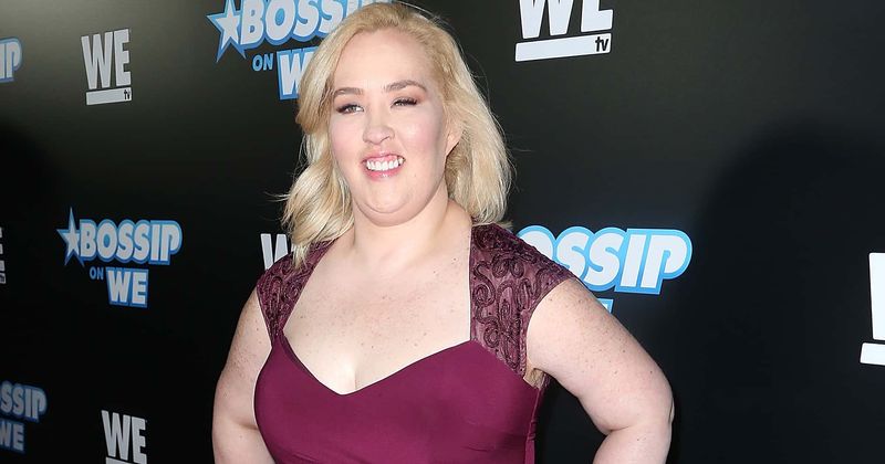 Mama June sizzles in plunging black jumpsuit and bling sneakers as fans praise her dramatic weight-loss journey