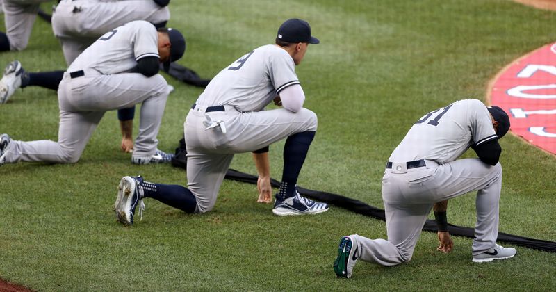 MLB 2020: Yankees, Nationals players and coaches kneel BEFORE national anthem, Internet says ‘in your face Trump’