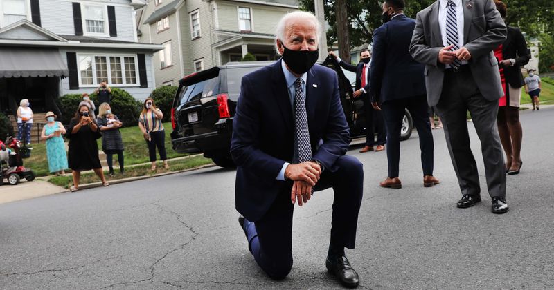 Fact check: Joe Biden was not 'taking a knee' after seeing National flag in Pennsylvania, was talking to a child