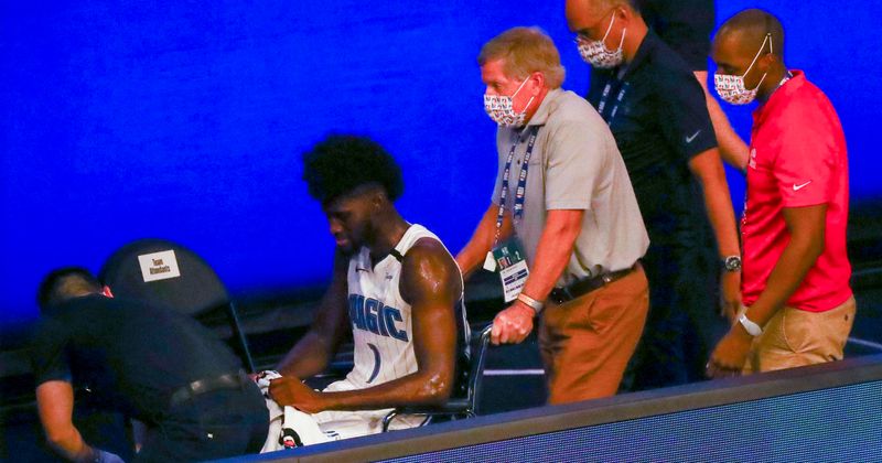 Magic's Jonathan Isaac suffers knee injury, Internet slams trolls who say ‘now he’ll kneel for the anthem’
