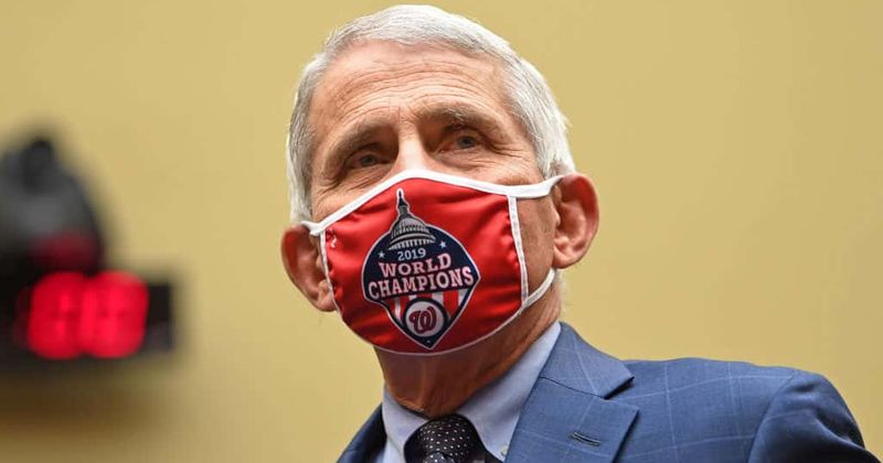 Fauci says people need to wear face masks through 2021 even if we have a Covid-19 vaccine