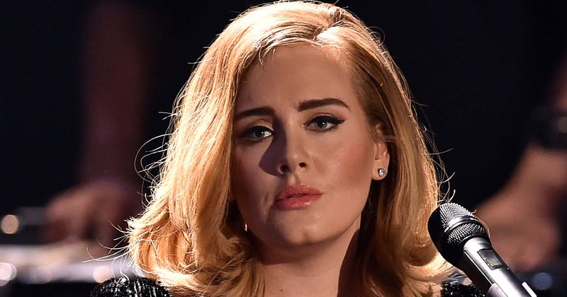 Adele's estranged dad calls cops on neighbor for singing, playing his daughter's songs loudly