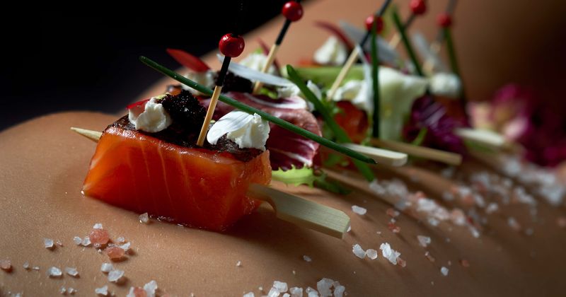 San Antonio fire chief faces probe after posing with naked woman serving body sushi at birthday party